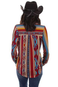 Right out of the old west. You will love this serape inspired blouse with western yokes. This western serape blouse will brighten your day!. It features a full button front and cuff closures with a point collar. Machine wash cold on delicate and flat dry. Fall Rodeo Long Sleeve Blouse, Fall Long Sleeve Blouse For Rodeo, Western Style Long Sleeve Tops For Festival, Multicolor Boho Collar Top For Fall, Red Western Style Tops For Ranch, Western Long Sleeve Blouse For Rodeo, Multicolor Long Sleeve Tops With Boho Collar, Fall Festival Multicolor Blouse, Serape Pattern