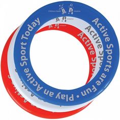 two red, white and blue frisbees sitting on top of each other