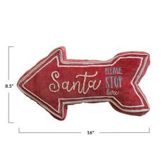 a red arrow shaped pillow with the words santa stop before it's too late