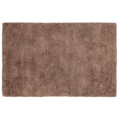 a brown rug on a white background with no one in the room to see it