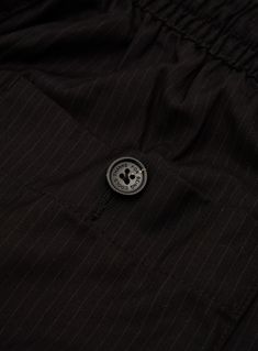 Whether you're dressing up for a formal occasion or keeping it casual, the Boxy Suit Pant in Black Micro is a staple. Constructed on a premium suiting fabric with a 90's inspired baggy fit. Elastic waistband Regular rise Fabric Drawcord Front Pleats Relaxed seat and thigh Black Formal Dress Pants With Button Closure, Formal Black Dress Pants With Button Closure, Black Dress Pants With Button Closure For Formal Occasions, Classic Black Dress Pants With Elastic Waistband, Classic Black Pantsuit With Pockets, Pinstripe Dress Pants With Welt Pockets For Work, Formal Black Dress Pants With Elastic Waistband, Black Business Casual Pantsuit With Welt Pockets, Black Business Pantsuit With Welt Pockets