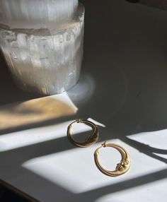 These unique earrings are the perfect complement to any outfit and occasion 🌙 They are nickel and lead free made of copper and hypoallergenic, they are coated in 14k gold plating. The coating has a matte effect making it look more vintage 💛 33mmx30mm Elegant Crescent Brass Hoop Earrings, Elegant Crescent Shaped Brass Hoop Earrings, Gold Moon-shaped Metal Hoop Earrings, Gold Moon Shaped Metal Hoop Earrings, Gold Moon Shaped Hoop Earrings, Gold Hoop Jewelry With Moon Phase Detail, Metal Moon-shaped Hoop Earrings, Gold Crescent Hoop Earrings With Moon Phase, Handmade Moon-shaped Metal Hoop Earrings