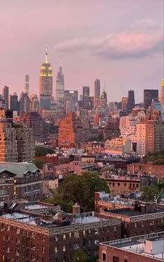 the skyline of new york city at sunset