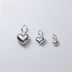 8-14mm Sterling Silver Heart Pendants , 925 Silver Charms Wholesale / TGF-s0590 Material: 925 sterling silver Color: silver Size: 8*6*3.5mm(small) 11*9*5mm(middle) 14*9*5mm(big) Quantity: 1 piece Welcome to our shop: https://www.etsy.com/shop/ClareAccessories Puffy Heart Charms, Diy Pendant Necklace, Sterling Silver Heart Pendant, Romantic Jewellery, 925 Silver Bracelet, Silver Heart Pendant, Valentines Necklace, Puffy Heart, Accessories Diy Jewelry