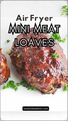 the words air fryer mini meat loaves on top of a white plate with parsley