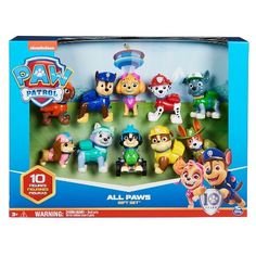 the paw patrol toy set is in its box and has many different characters on it