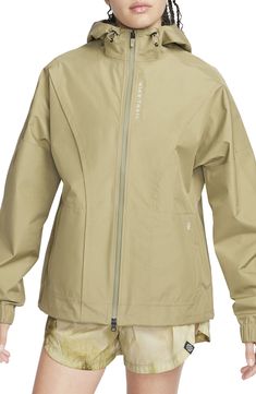 Power through wind and rain in this hooded running jacket in a lightweight, free-moving design bolstered with Gore-Tex weatherproofing. Conveniently placed storage lets you safely stash essentials, and the entire design packs into the pocket so you can gear up or down depending on the weather. Two-way front-zip closure Drawcord-toggle hood Adjustable hook-and-loop cuffs Front zip pockets; rear zip pocket Packs into pocket Back vent Gore-Tex Infinium insulation is windproof, water-resistant and b Gortex Jacket, Nike Web, Sports Wear Women, Cycling Jacket, Packable Jacket, Youth Sports, Women Sports, Outdoor Jacket, Sports Wear