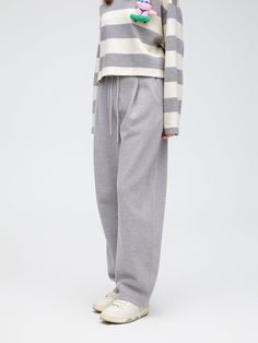 Details: Spotted grey sweatpants with a touch of blues Combination of elasticated waistband and large pleats Relaxed fit Materials & Care: Polyester fibre 52.9%Cotton 44.7 %Spandex 2.4% Hand wash | Dry clean Do not bleach Size & Fit: Model is 5'7", Bust 32, Waist 24, Hips 35, wearing a size S Item #: LN1PA06 Gray Loungewear Pants With Elastic Cuffs, Gray Bottoms With Elastic Cuffs And Relaxed Fit, Gray Pants With Ribbed Waistband For Fall, Gray Fall Pants With Ribbed Waistband, Fall Gray Pants With Ribbed Waistband, Gray Sweatpants With Ribbed Waistband For Spring, Gray Relaxed Fit Pants With Elastic Cuffs, Gray Pants With Ribbed Cuffs For Fall, Gray Tapered Leg Sweatpants With Elastic Waistband