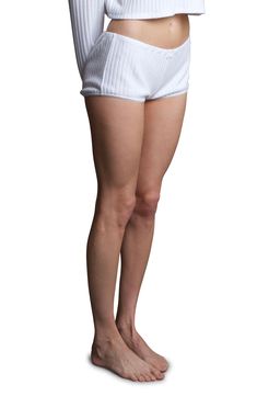 With a drapey fit and flirty picot trim, these ribbed lounge pants will become your day-to-night essential. 1" inseam; 22" leg opening Pull-on style 48% polyester, 40% rayon, 4% spandex Machine wash, dry flat Made in the USA Stretch Cotton Ribbed Shorts, Relaxed Fit Ribbed Bottoms For Relaxation, Spring Ribbed Bottoms Short Length, Fitted Summer Bottoms For Lounging, High-cut Leg Summer Loungewear Bottoms, Stretch Pajama Shorts For Loungewear, Ribbed Short Bottoms, Ribbed Bottoms For Summer Lounging, Ribbed Loungewear Bottoms For Spring