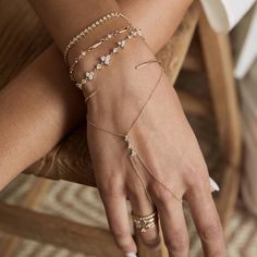 14k gold hand chain with a three prong set round diamond trios linked together in the center Hand Bracelet With Ring, Gold Hand Chain, Finger Bracelets, Hand Chain Bracelet, Engagement Rings Couple, Diamond Bracelet Design, Gold Hand, Funky Jewelry, Hand Chain