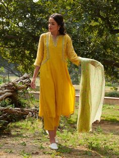 Kurta with pretty Dori embroidery, print dupatta & pants Fabric: Handwoven Mal Cotton Silk Color: Yellow Embroidery Details: Thread embroidery Note: Wash Care - Dry clean only The product will be shipped within 20-25 days of order placed Measurement: Kurta / Dress / Top Standard Body Measurement ( in Inch) Size Bust Waist Hip Shoulder Armhole Sleeve Length XS 34 32 36 14 16.5 16 46 S 36 34 38 14 17 16 46 M 38 36 40 15 17.5 16 46 L 40 38 42 15.5 18.5 16 46 XL 42 40 44 16 19.5 16 46 XXL 44 42 46 1 Designer Dresses Elegant, Dori Embroidery, Silk Kurta Set, Yellow Embroidery, Embroidery Print, Fashion Terms, Kurta Dress, Body Measurement, Silk Kurta