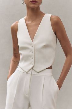 Designed with a mid-rise fit, the Pin Tuck Palazzo Pants feature a gentle drape that blends classic elegance with modern flair, offering a sophisticated addition to your wardrobe. | Pin Tuck Palazzo Pants by SANS FAFF in White, Women's, Size: Largearge, Polyester/Viscose/Ecovero at Anthropologie Elegant Office Pantsuit With Structured Boning, Chic Spring Pantsuit With Hidden Button Closure, Elegant Pantsuit With Pressed Crease, Elegant Tailored Pantsuit For Semi-formal, Elegant Workwear Pantsuit With Pressed Crease, Elegant Pantsuit With Pressed Crease For Work, Chic Formal Pantsuit With Hidden Button Closure, Elegant Fitted Structured Pantsuit, Elegant Structured Pantsuit For Semi-formal Occasions