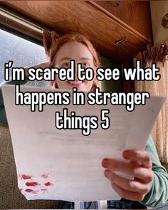 a woman reading a piece of paper with the caption i'm scared to see what happens in strange things 5