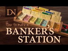 a wooden box filled with money sitting on top of a table next to a sign that says how to make a banker's station