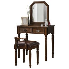 a dressing table with a mirror and stool