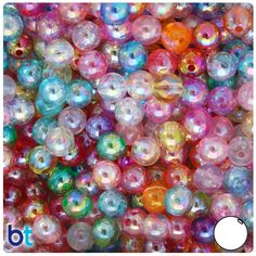 many different colored beads are shown in this image and there is also an apple logo on the bottom right corner