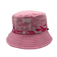 Step up your style game with our CALI Strong Pink Camo Reversible Bucket Hat with Morale Patch. This versatile accessory blends a fashionable pink camo design with a solid-colored reversible option for a fresh look every day. Crafted for comfort and excellent UPF 50+ sun protection, it's the perfect choice for outdoor activities or city strolls. The included morale patch adds a unique touch to your stylish tactical hat. Embrace the vibrant pink camo trend with your CALI bucket hat. Try different Pink Bucket Hat For Outdoor Activities, Pink Curved Brim Bucket Hat For Outdoor, Pink Adjustable Fit Bucket Hat For Outdoor, Pink Adjustable Bucket Hat For Outdoor, Casual Pink Bucket Hat For Outdoor, Pink Reversible Bucket Hat With Curved Brim, Casual Pink Reversible Hat, Pink Bucket Hat With Adjustable Fit And Curved Brim, Casual Reversible Pink Bucket Hat