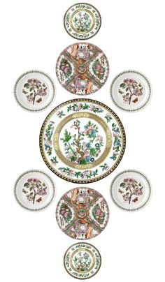 four plates with different designs on them