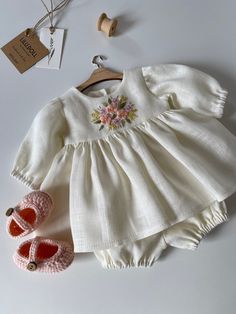 Doll clothes set for Waldorf dolls 14-15"/ 36-40 cm. Ready to ship 📦✈️ The set includes 3 items: * ivory dress, made of soft 100% linen. The highlight of the dress is the beautiful handmade floral embroidery. The price for embroidery is included in the price of the dress. Dress length 8.6 inches/ 22 cm. * ivory shorts (material 100% linen) * knitted shoes High quality tailoring. This set are suitable for 14-15 inch/ 36-38 cm dolls with a waist circumference of no more than 12.6 inch/ 32 cm. The entire assortment of clothes for dolls can be viewed here https://www.etsy.com/shop/LiluWaldorfDoll?ref=dashboard-header  Happy shopping! Kylie Jenner Plastic Surgery, Knitted Shoes, Kids Frocks Design, Dashboard Header, Kids Gown, Ivory Dress, Kids Frocks, Fabric Combinations