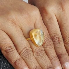 Unique birthday gifts for women, to make your mum, girlfriend, wife or sister feel truly special on their big day! This natural raw citrine ring bezel set on 18k yellow gold vermeil, this simple brass ring is a pure stunner. Citrine is the traditional birthstone for November, and is an alternate Zodiac stone for Scorpio. Natural Bright Raw Citrine Stone Ring With 18K Gold Flash Plating, Artisan Made November Birthstone Ring Jewelry  Product Details Item Code: BJBR-0087 Stone Name: Citrine Stone Minimalist Gold Topaz Ring As Gift, Minimalist Gold Topaz Ring Gift, Faceted Citrine Rings Ideal For Gifts, Faceted Citrine Ring Perfect For Gifts, Faceted Citrine Ring For Gift, Faceted Citrine Rings For Gifts, Yellow Topaz Ring As A Gift, Gold Topaz Gemstone Ring As A Gift, Yellow Faceted Rings As A Gift