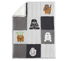 a baby blanket with star wars characters on it