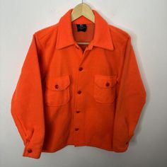 Vintage Thermal King  Men S Bright Orange Hunting  Fleece Button Shirt Shacket   70s EUC  Measures Pit to pit 20 in  Shoulder to hem 27.5 in  Shoulder to shoulder 17 in  Shoulder to cuff 24 in  Condition Excellent no damage or stains Retro Button-up Top For Winter, Vintage Winter Tops With Pockets, Vintage Collared Tops For Winter, Bright Clothes, Bright Outfits, Kings Man, Men's Coats And Jackets, Button Shirt, Bright Orange