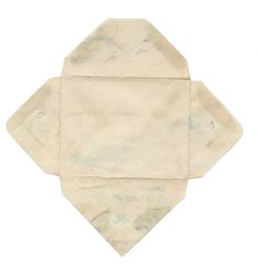 a piece of paper that has been folded into an origami like shape with blue ink on it