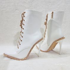 Brand New White Vegan Leather Upper Rose Gold Trim On Tongue & Footbed. Adjustable Rhinestone Capped Laces Lace Up The Front Slim Stilettos Heels Stunning Sparkle & Soo Delightful To Look At. White High Ankle Boots For Party, White High Heel Boots With Rhinestones, White Rhinestone High Heel Boots, White Embellished Boots With Pointed Toe, White Embellished Spring Boots, Glamorous White Embellished Boots, White Rhinestone Boots For Spring, White Ankle Boot Heels For Party, White Ankle Boots For Parties