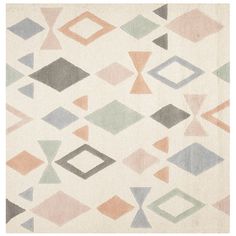 an area rug with various shapes and colors