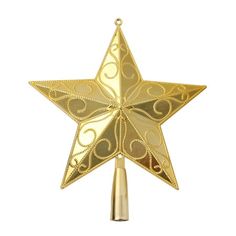 a gold star ornament hanging on a white wall