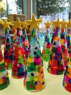 many colorful party hats with stars on them