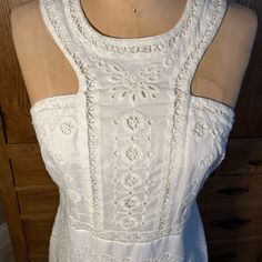 This White And Lined Detailed Embroidered Dress From Anthropologie Is New With Tags. Size 6 And Ready For A Great Day Out In The Sun. Spring Sleeveless Embroidered Dress, Spring Sleeveless Dress With Intricate Embroidery, Sleeveless Embroidered Dress For Spring, Spring Lace Dress With Cutwork, Spring Fitted Dress With Cutwork, Sleeveless Embroidered Dress With Lace Trim For Spring, Spring Fitted Cutwork Dresses, Spring Cutwork Fitted Dress, White Embroidered Sleeveless Dress With Lace Trim