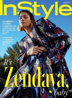 the cover of instyle magazine featuring an image of a woman in a colorful dress