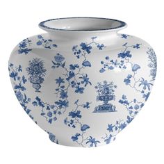 a blue and white vase with flowers on the bottom is sitting in front of a white background