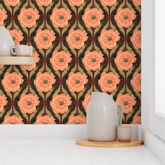 an orange and brown wallpaper with flowers on it in a kitchen area next to a window