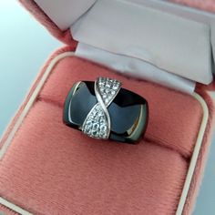 Thank you for visiting the SoChicFinds store - vintage and antique, costume and fine jewelry.  Black metal-ceramic band ring. Brand: CEB.  Metal: Sterling silver -925 silver. Gemstone: round CZ -cubic circonia. Weight of the sterling silver ring: 9.44 grams.  CZ ring is a size: diameter 17mm  ( US -6.5;  EU-53). Vintage jewelry in exellent condition. Black Ceramic Wide Band 925 Silver Ring, Sterling Silver Cubic Zirconia Ring, Vintage Metal Ceramic CZ Jewelry Elegant Sterling Silver Enamel Ring For Anniversary, Elegant Silver Enamel Ring For Anniversary, Elegant Silver Enamel Ring For Formal Occasions, Elegant Diamond Ring With Black Enamel As Gift, Elegant Enamel Ring With Diamond Accents For Gift, Elegant Silver Enamel Ring For Formal Events, Elegant Diamond Enamel Ring For Gift, Black Enamel Diamond Ring Perfect As A Gift, Diamond Rings With Black Enamel As A Gift