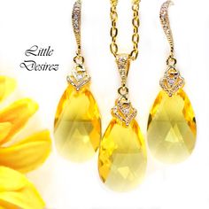 "Yellow Jewelry Set Yellow Necklace & Earrings Crystal Earring Bridesmaid Earrings Lemon Zest Canary Yellow Sunshine Yellow Jewelry This listing is for the Necklace AND Earrings set shown in the first picture. Hello Sunshine! Cheerful and sparkling Crystal Sunflower Yellow Teardrop Earrings and Necklace Jewelry Set! A bright, happy and super sparkly jewelry that will light up your day. Jewelry Set made with: - gorgeous 22mm genuine Light Topaz/Yellow pear shaped pendant crystals (these are N Turquoise Wedding Jewelry, Mint Green Earrings, Yellow Sunshine, Topaz Yellow, Pear Shaped Pendant, Vintage Wedding Jewelry, Yellow Bridesmaids, Yellow Necklace, Yellow Jewelry