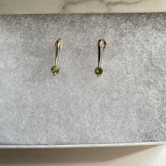 Beautiful Luxurious 14k White Gold Stud Earrings With Light Green Gemstone. I Think The Gemstone Is Peridot, But I’m Not Sure. It Is 100% A Real Gemstone, Considering The Earrings Are 14k White Gold (See Stamp In Photo 3), I’m Just Not Sure What Kind. It Looks Very Similar To Peridot. Like New Condition, Comes Gift Wrapped. #Luxury #Celebstyle #Gold #Silver #Jewelry #Elegant #Japanesestreetwear #Streetwear #Avantgarde #Selfexpression #Vintage #Chic #Metallic #Luxe #Colorful Classic Peridot Birthstone Jewelry, Green Modern Sterling Silver Earrings, Modern Green Sterling Silver Earrings, White Gold Peridot Jewelry With Birthstone, Fine Jewelry Peridot For Formal Occasion, Formal Fine Jewelry With Peridot, Modern Peridot Jewelry For Formal Occasions, Elegant Peridot Jewelry For May Birthstone, Formal Peridot Jewelry For May Birthstone