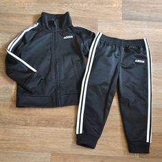 Never Worn 24 Months Black And White Striped Track Suit Unisex Adidas Fitted Long Sleeve Sets, Adidas Winter Sets With Long Sleeve, Adidas Winter Long Sleeve Sets, Sporty Black Sets For Fall, Adidas Fitted Winter Sets, Winter Adidas Fitted Sets, Adidas Fitted Playwear Sets, Adidas Fitted Sets For Playwear, Adidas Black Long Sleeve Set