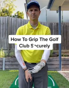 a man standing on top of a green field holding a golf club's glove