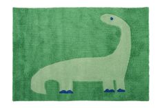 a green rug with a white dinosaur on it