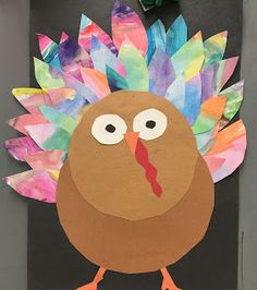 a turkey made out of construction paper and tissue paper