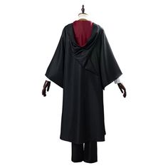 a black cape with red linings on the collar and sleeves, hanging from a mannequin's head