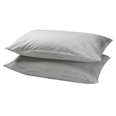 two pillows sitting on top of each other