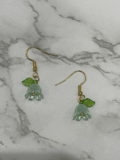 Mint green dangle flower earrings. Made with plastic, Sterling, and stainless steel. Color can be silver or gold. Green Flower Earrings, Mint Green Flowers, Mint Earrings, White Flower Earring, Green Charms, Mint Flowers, Earring Ideas, Green Flower, Dangly Earrings