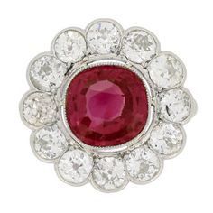 Burmese Ruby Diamond Platinum Cluster Ring | From a unique collection of vintage cluster rings at https://www.1stdibs.com/jewelry/rings/cluster-rings/ 1960s Engagement Ring, Vintage Cluster Ring, Cluster Ring Set, Extraordinary Design, Burmese Ruby, Pattern Motif, Rosecut Diamond Ring, Daisy Ring, Ruby Diamond Rings