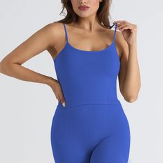 Olivia Mark - Seamless Knit Sportswear Set with Ribbed Yoga Outfit for Fitness Blue Sleeveless Activewear With Seamless Construction, Blue Seamless Sports Bra, Blue Seamless Tank Top For The Gym, Blue Seamless Tank Top For Gym, High Stretch Ribbed Solid Sports Bra, Blue Ribbed Athleisure Tops, Solid Ribbed Sports Bra For Yoga, Blue Seamless Tops For Pilates, Fitted Ribbed Blue Activewear