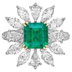 an emerald and diamond broochle