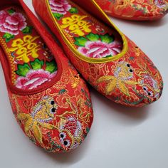 Traditional Handmade Red Floral Wedding Flat Shoes ** Free Gift ** - Comes along with a pair of beautiful embroidered Double Happiness insoles  Available in Golden and Red side bordery. ♥ Must wear when the weekend with a short skirt or jeans ♥ Fits true to size ♥ Suitable for casual ♥ Comfortable Material: Cotton Canvas Crafting Technique: Embroidery Sole: Rubber Shoes Sizes: EU35, EU36, EU37, EU38, EU39, EU40, EU41 Color: Red Traditional Luxury Embroidered Wedding Shoes, Traditional Multicolor Flats With Round Toe, Red Round Toe Wedding Shoes, Traditional Multicolor Round Toe Flats, Chinese Wedding Shoes, Fish Wedding, Red Bridal Shoes, Jeans Fits, Fishing Wedding