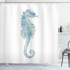 a shower curtain with a sea horse on it